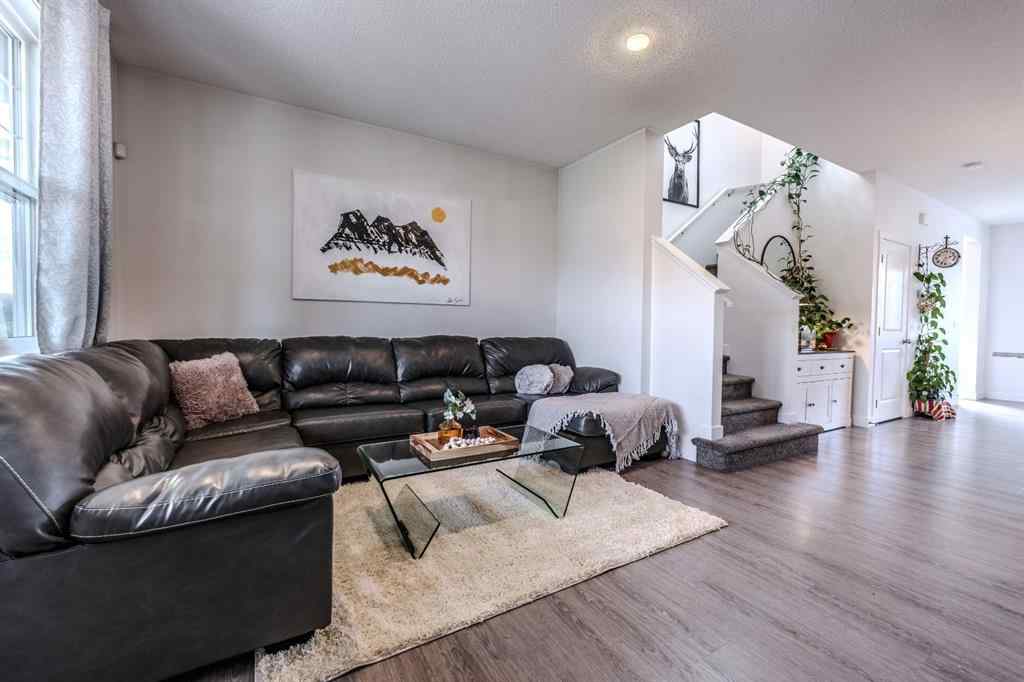 MLS® A2262360 - 239 Sundown Road  in Sunset Ridge Cochrane, Residential