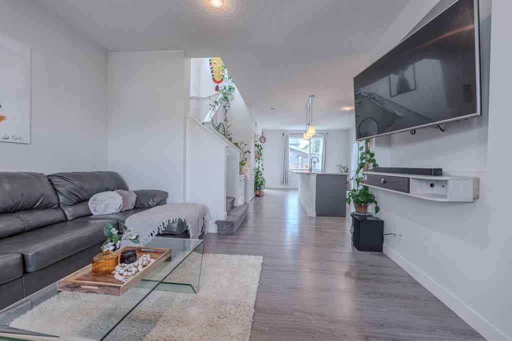 MLS® A2262360 - 239 Sundown Road  in Sunset Ridge Cochrane, Residential