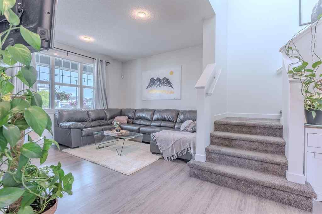 MLS® A2262360 - 239 Sundown Road  in Sunset Ridge Cochrane, Residential