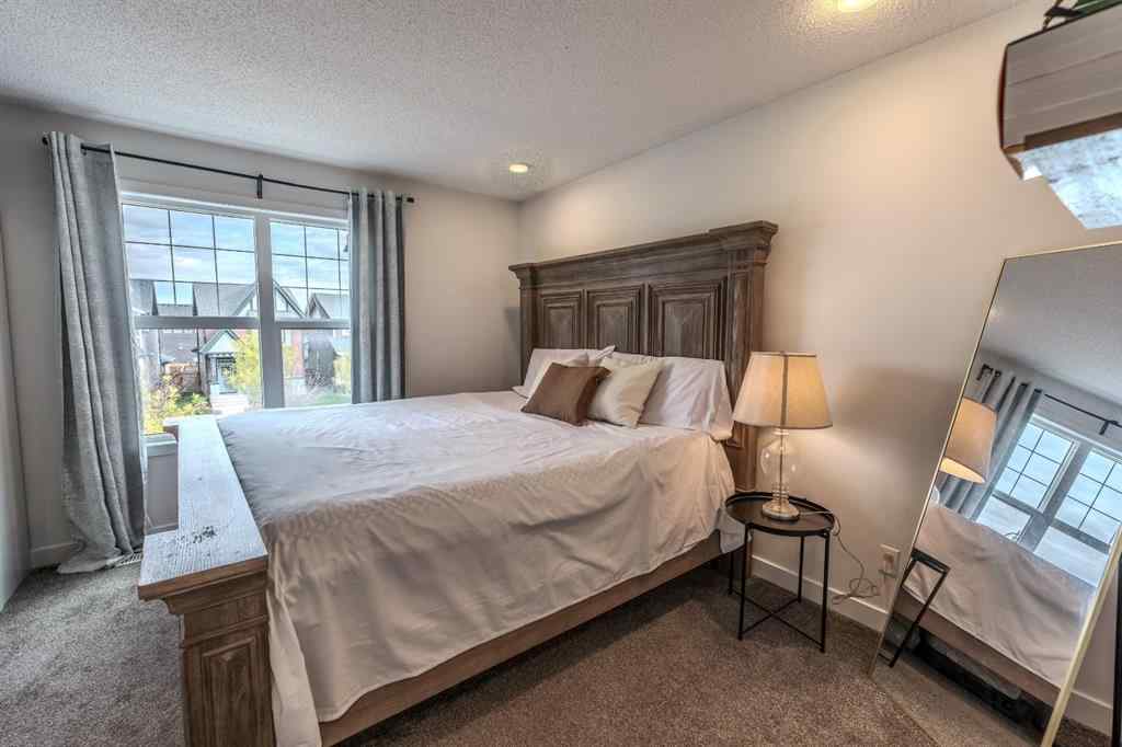 MLS® A2262360 - 239 Sundown Road  in Sunset Ridge Cochrane, Residential