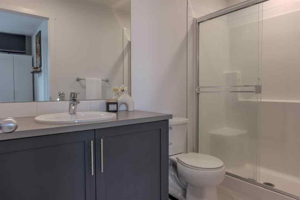 MLS® A2262360 - 239 Sundown Road  in Sunset Ridge Cochrane, Residential