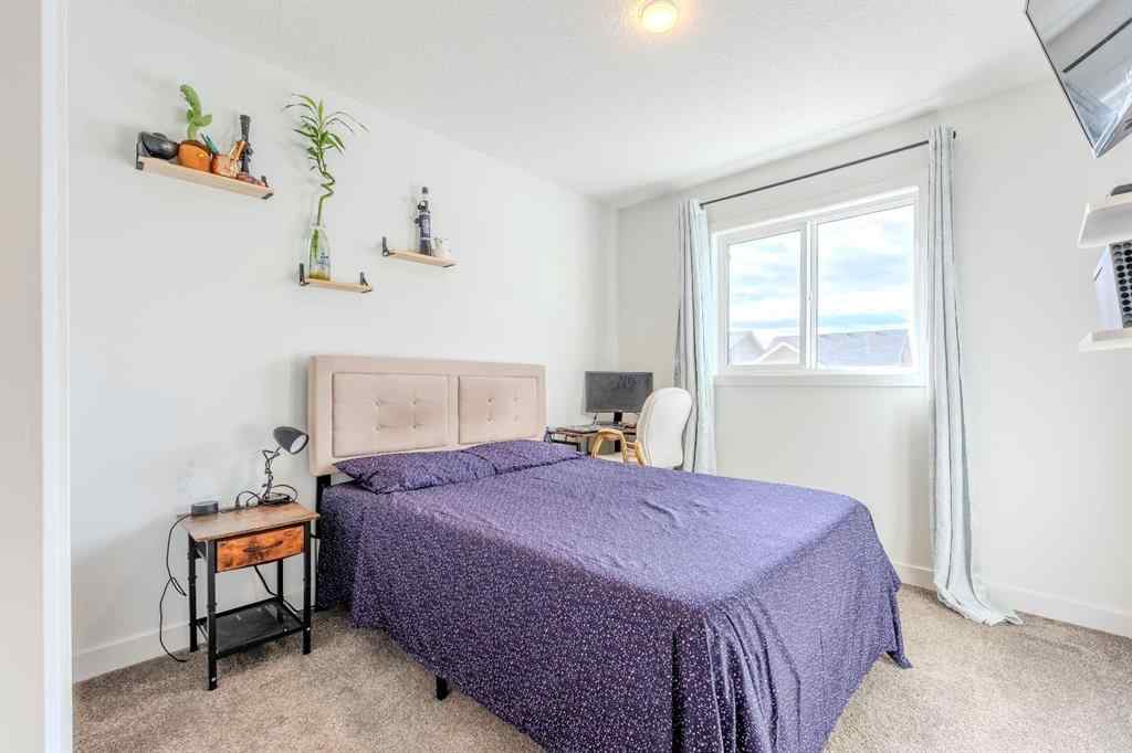 MLS® A2262360 - 239 Sundown Road  in Sunset Ridge Cochrane, Residential