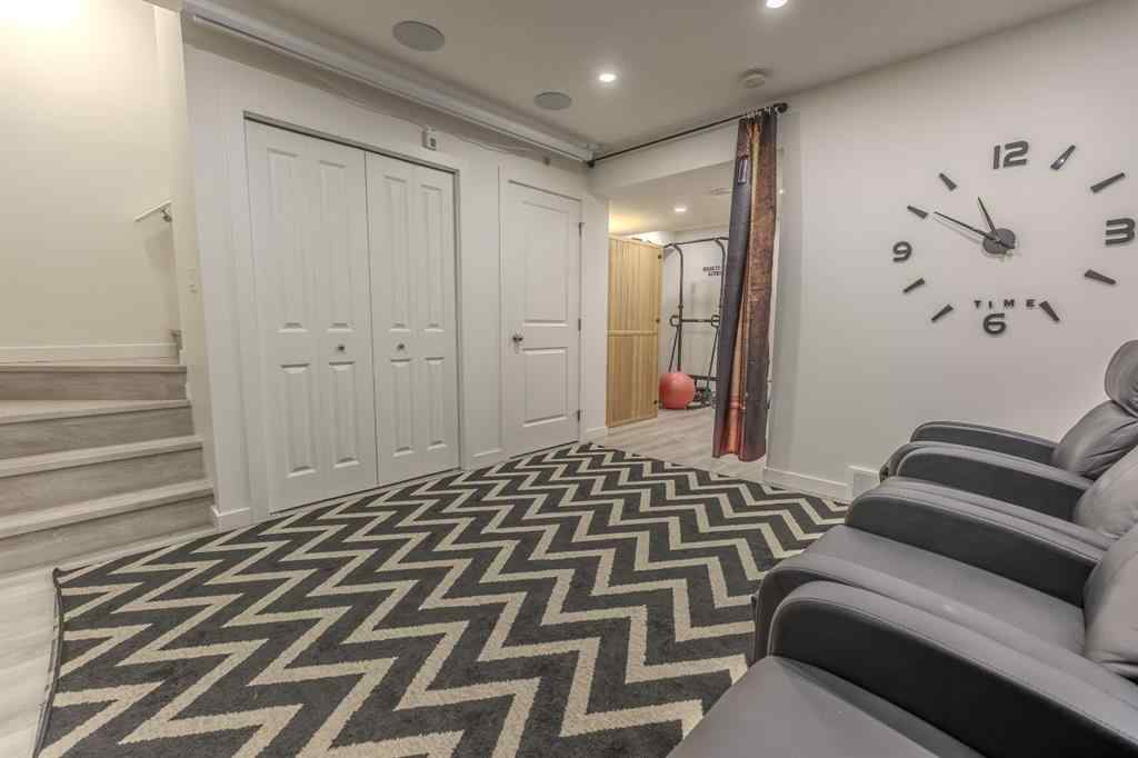 MLS® A2262360 - 239 Sundown Road  in Sunset Ridge Cochrane, Residential