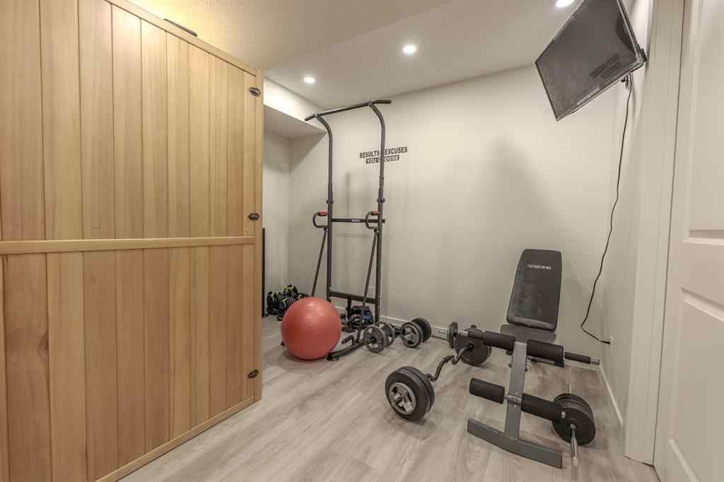 MLS® A2262360 - 239 Sundown Road  in Sunset Ridge Cochrane, Residential