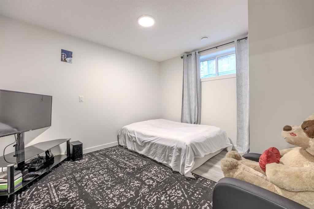 MLS® A2262360 - 239 Sundown Road  in Sunset Ridge Cochrane, Residential