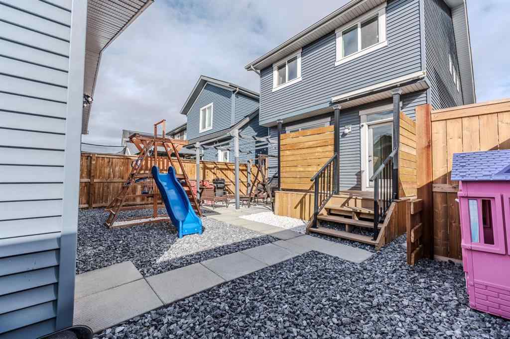 MLS® A2262360 - 239 Sundown Road  in Sunset Ridge Cochrane, Residential
