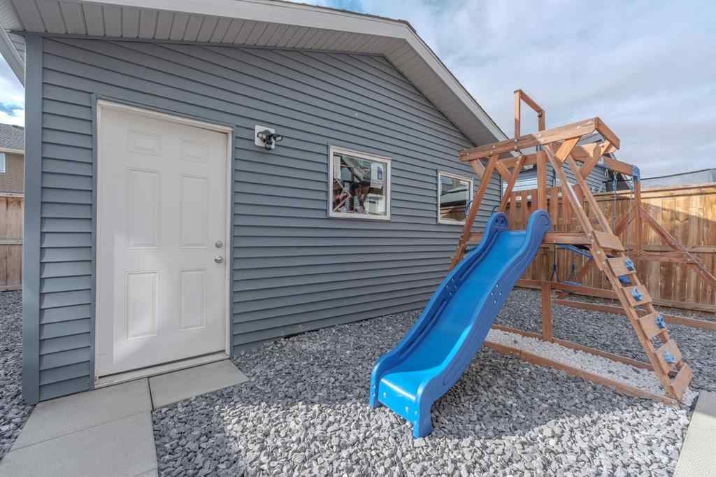 MLS® A2262360 - 239 Sundown Road  in Sunset Ridge Cochrane, Residential