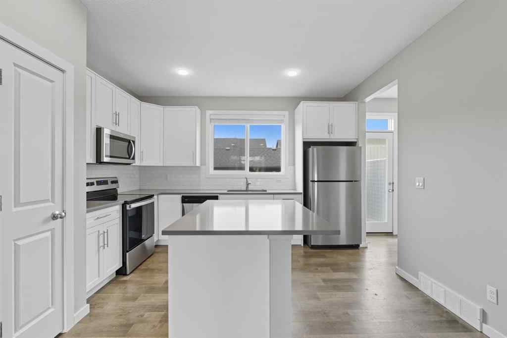 MLS® A2262364 - 167 Highview Gate SE in Lanark Airdrie, Residential