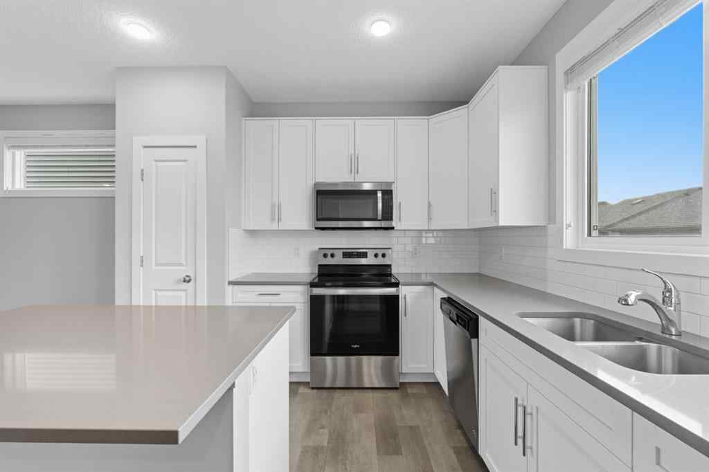 MLS® A2262364 - 167 Highview Gate SE in Lanark Airdrie, Residential