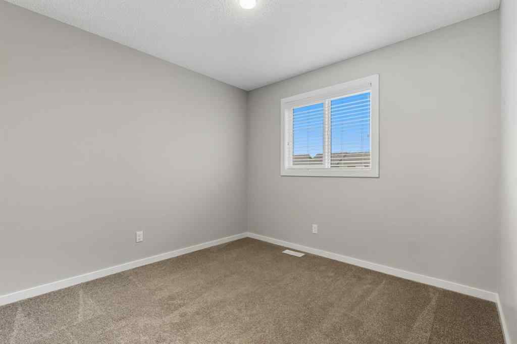 MLS® A2262364 - 167 Highview Gate SE in Lanark Airdrie, Residential