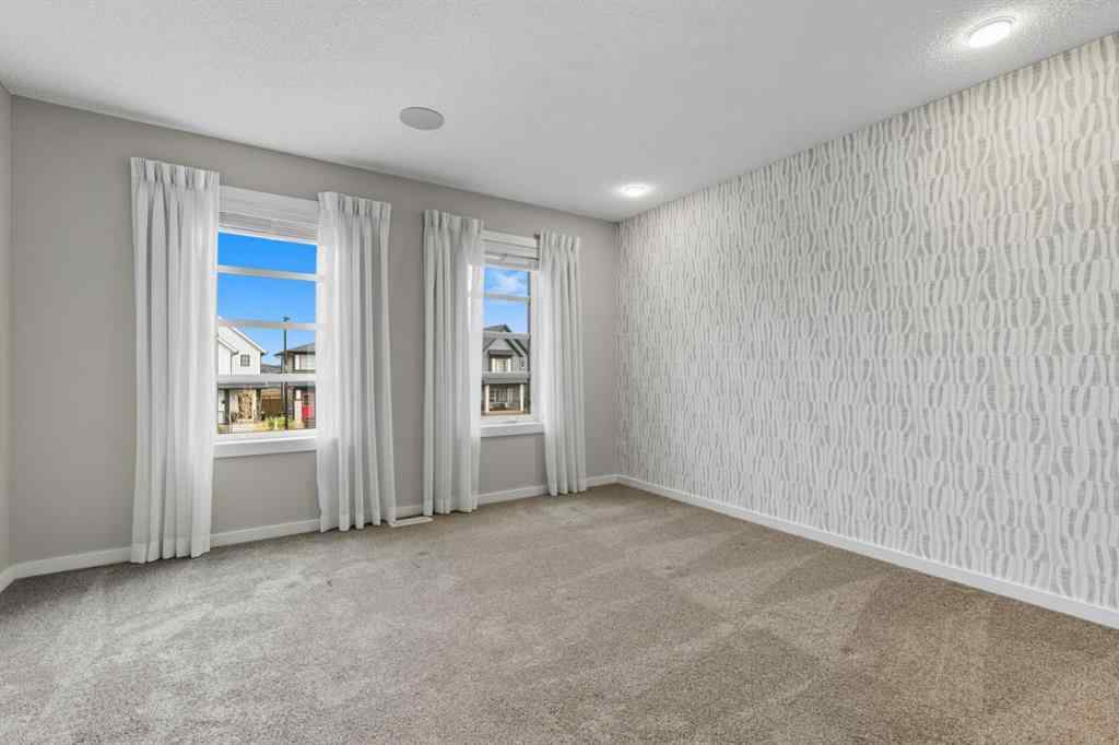 MLS® A2262364 - 167 Highview Gate SE in Lanark Airdrie, Residential