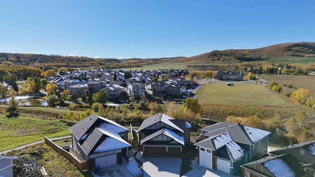 MLS&reg; # A2262368 - 679 Anderson Close NW in NONE Diamond Valley, Residential Open Houses