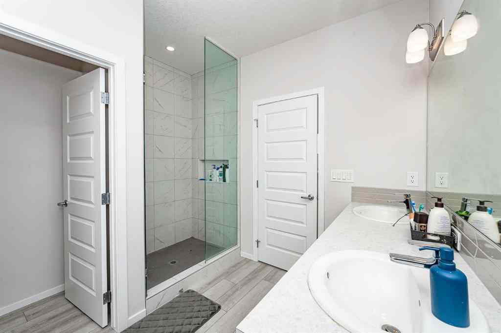 MLS® A2262371 - 717 Windrow Manor SW in South Windsong Airdrie, Residential