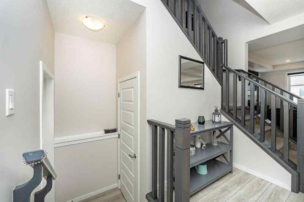 MLS® A2262371 - 717 Windrow Manor SW in South Windsong Airdrie, Residential