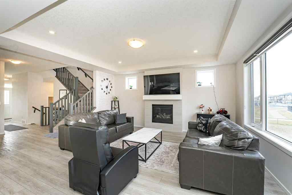 MLS® A2262371 - 717 Windrow Manor SW in South Windsong Airdrie, Residential