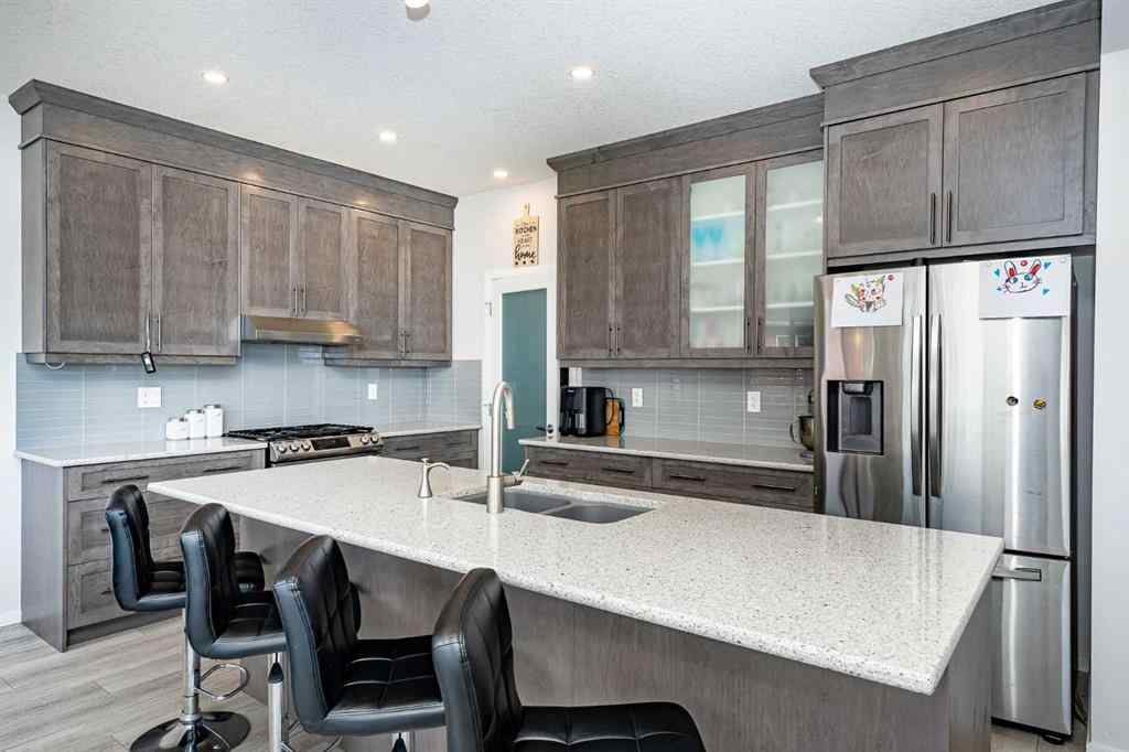 MLS® A2262371 - 717 Windrow Manor SW in South Windsong Airdrie, Residential