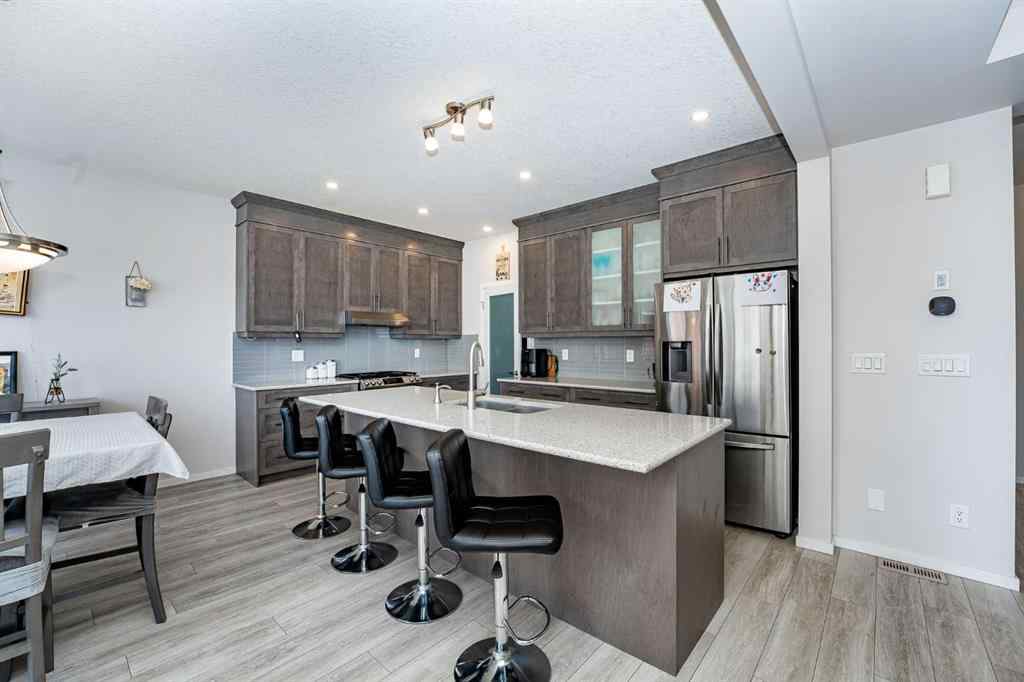 MLS® A2262371 - 717 Windrow Manor SW in South Windsong Airdrie, Residential