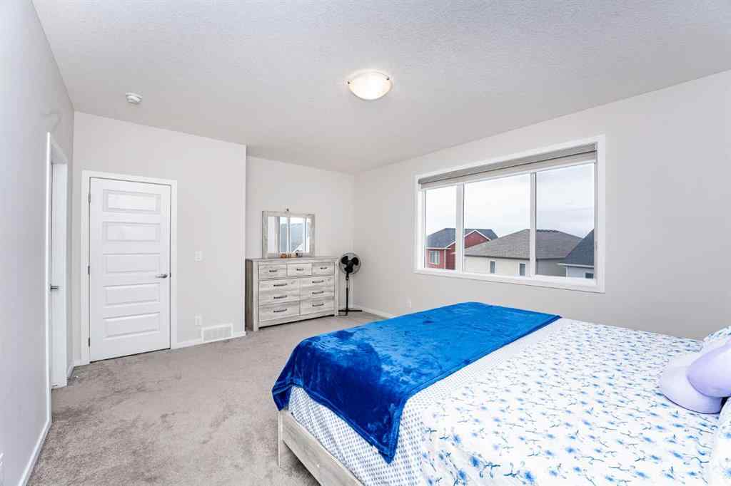 MLS® A2262371 - 717 Windrow Manor SW in South Windsong Airdrie, Residential