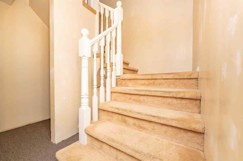 MLS® A2262406 - 215 Coachway Lane SW in Coach Hill Calgary, Residential