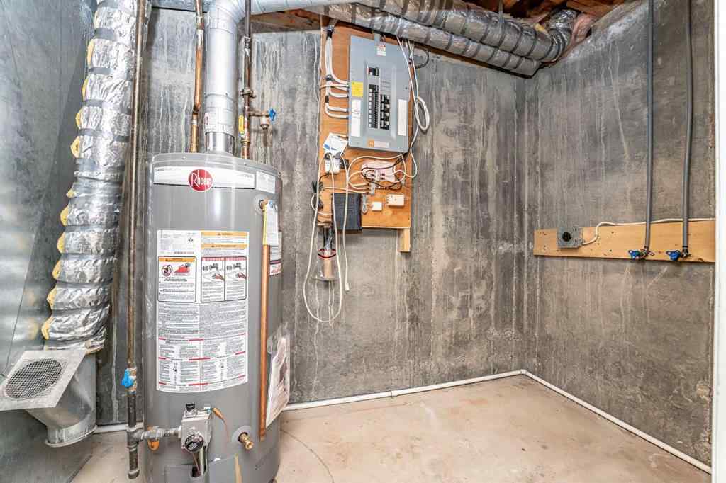 MLS® A2262406 - 215 Coachway Lane SW in Coach Hill Calgary, Residential