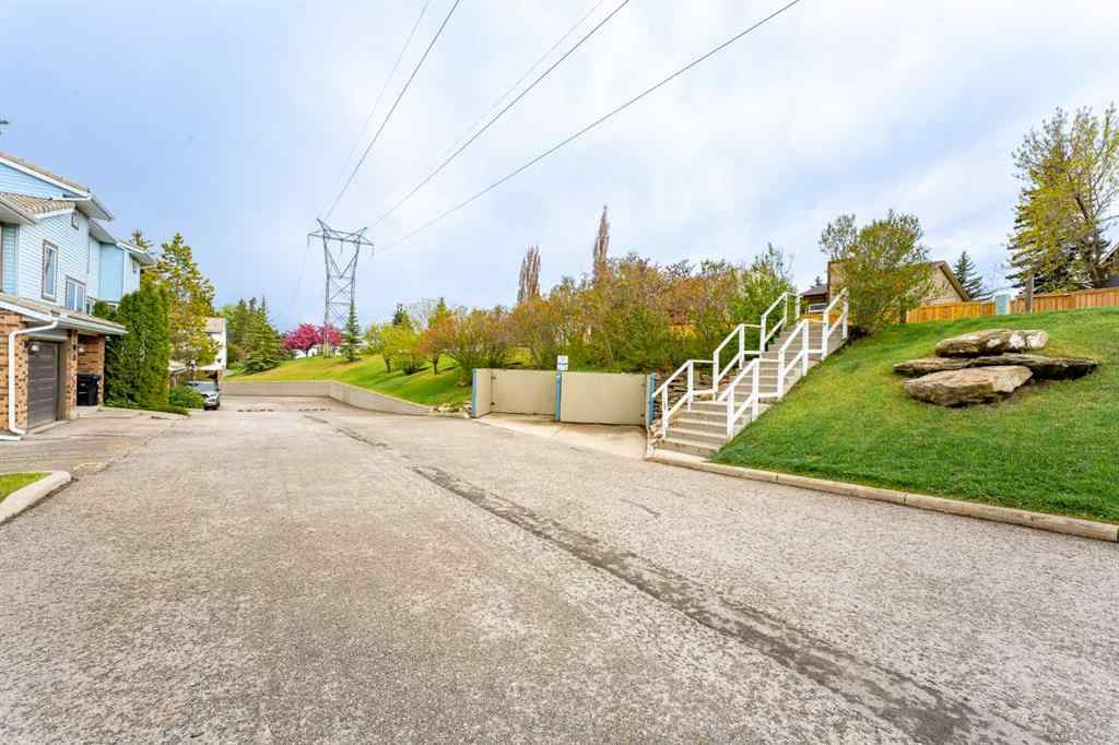 MLS® A2262406 - 215 Coachway Lane SW in Coach Hill Calgary, Residential