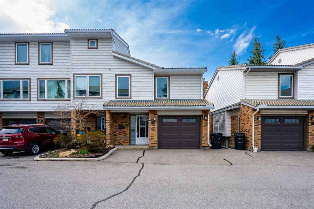 MLS® A2262406 - 215 Coachway Lane SW in Coach Hill Calgary, Residential