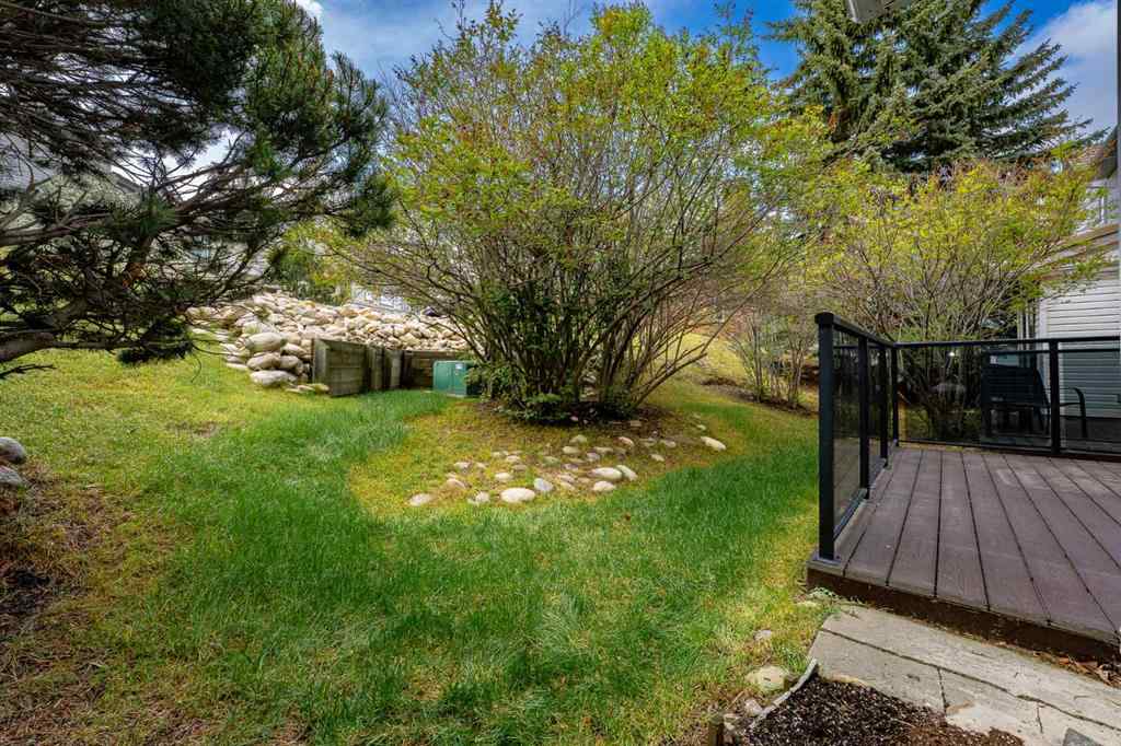 MLS® A2262406 - 215 Coachway Lane SW in Coach Hill Calgary, Residential