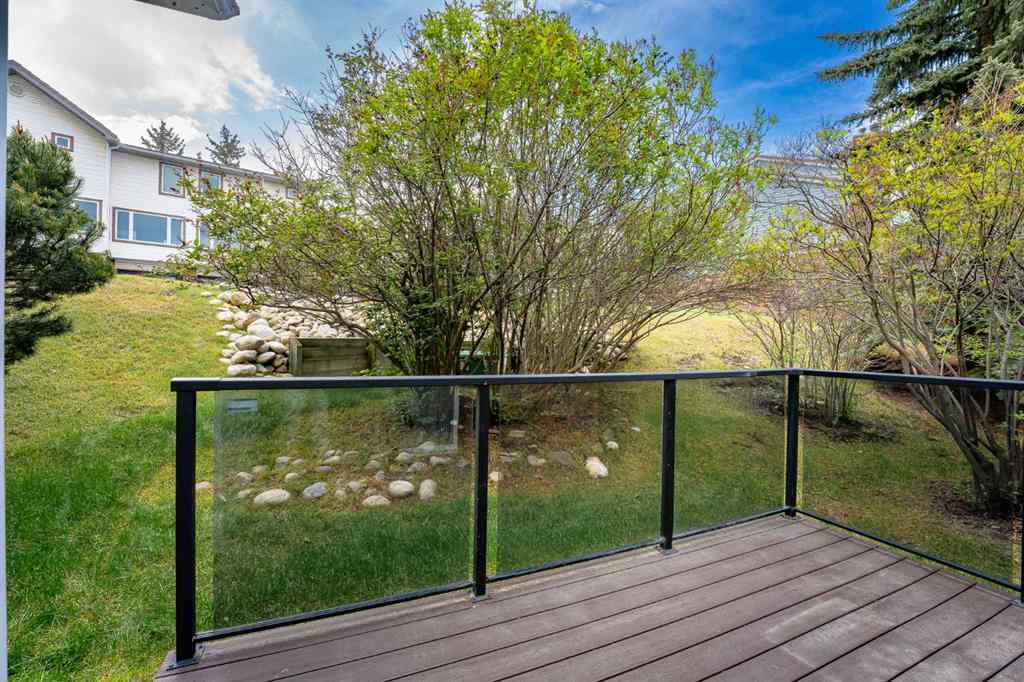 MLS® A2262406 - 215 Coachway Lane SW in Coach Hill Calgary, Residential