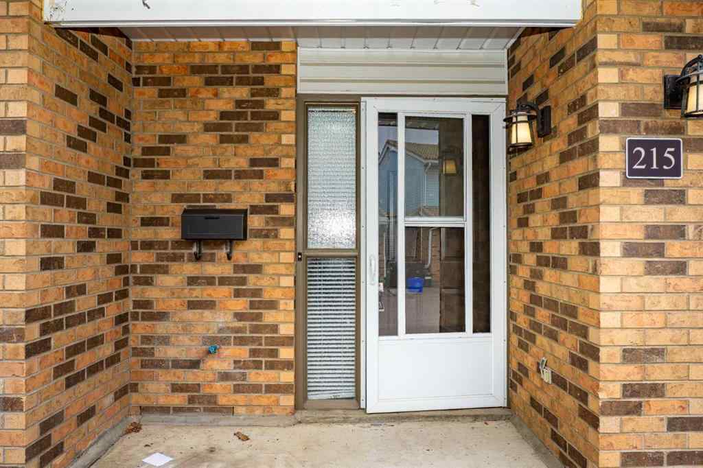 MLS® A2262406 - 215 Coachway Lane SW in Coach Hill Calgary, Residential