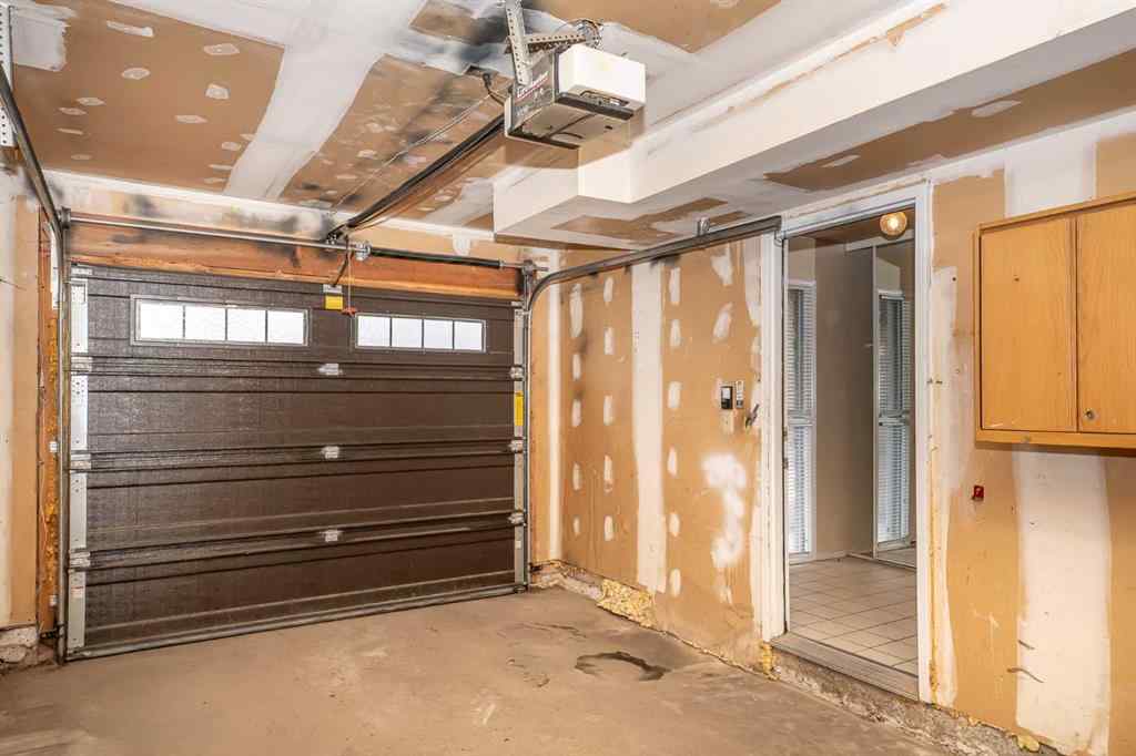 MLS® A2262406 - 215 Coachway Lane SW in Coach Hill Calgary, Residential