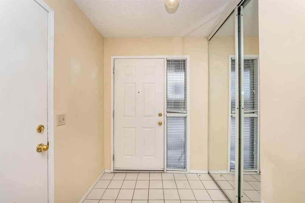 MLS® A2262406 - 215 Coachway Lane SW in Coach Hill Calgary, Residential