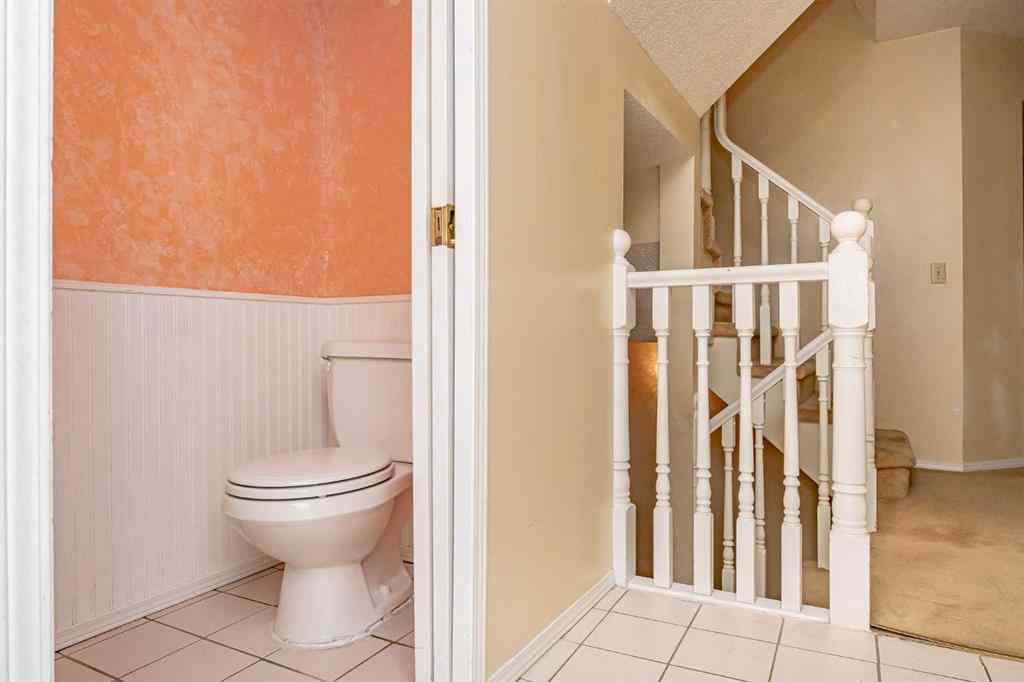 MLS® A2262406 - 215 Coachway Lane SW in Coach Hill Calgary, Residential