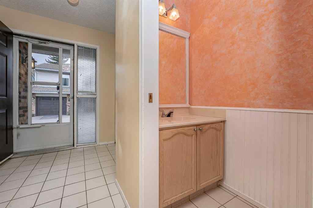 MLS® A2262406 - 215 Coachway Lane SW in Coach Hill Calgary, Residential