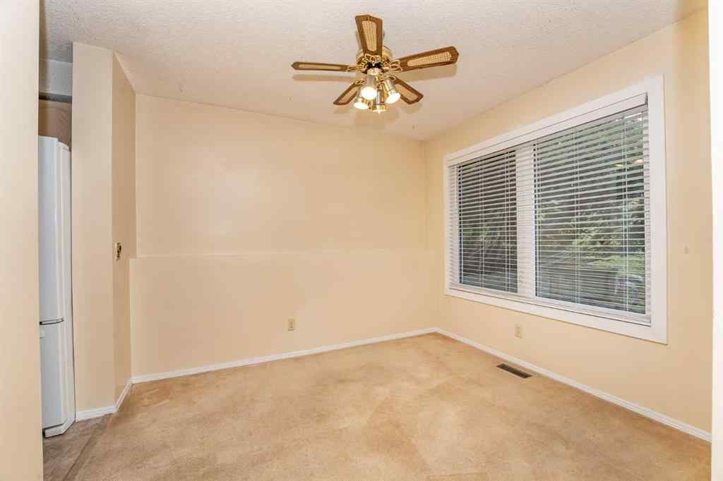 MLS® A2262406 - 215 Coachway Lane SW in Coach Hill Calgary, Residential