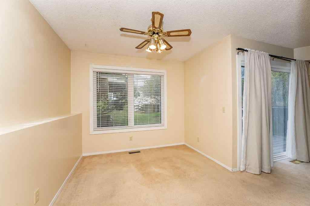 MLS® A2262406 - 215 Coachway Lane SW in Coach Hill Calgary, Residential