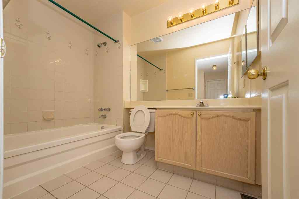 MLS® A2262406 - 215 Coachway Lane SW in Coach Hill Calgary, Residential