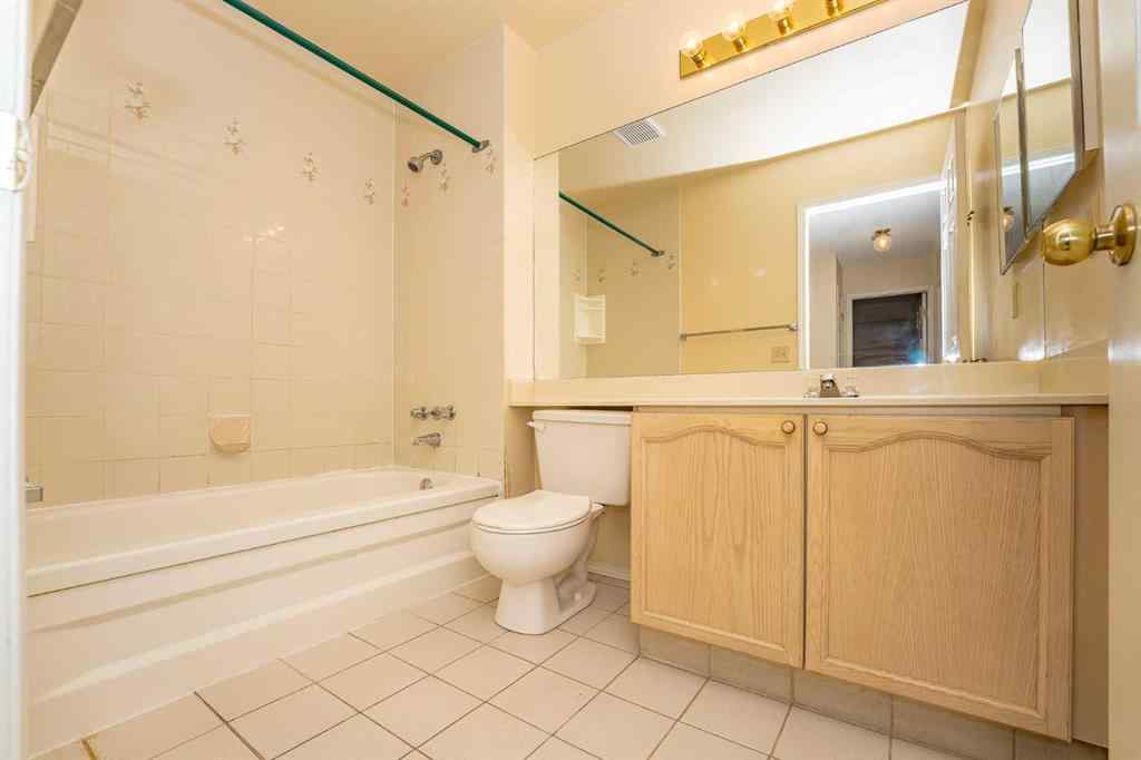 MLS® A2262406 - 215 Coachway Lane SW in Coach Hill Calgary, Residential