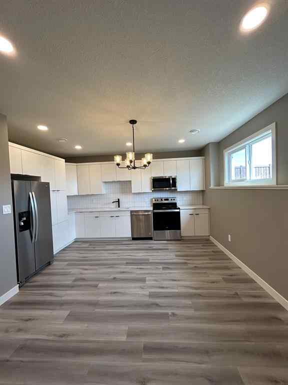 MLS® A2262409 - 11306 107 Avenue  in Westgate Grande Prairie, Residential