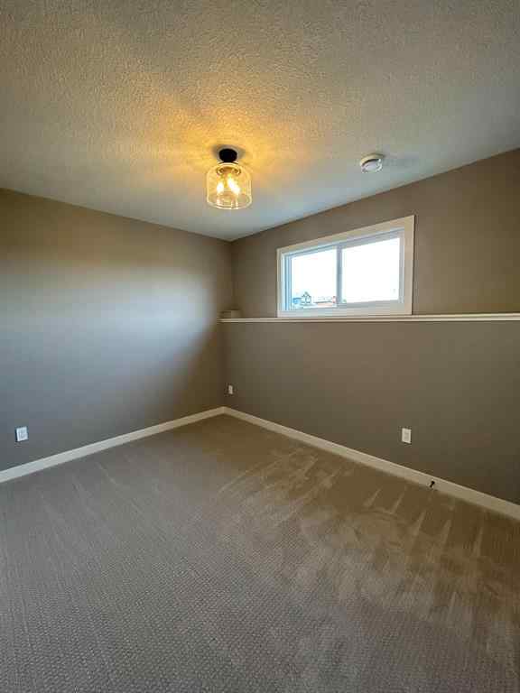 MLS® A2262409 - 11306 107 Avenue  in Westgate Grande Prairie, Residential