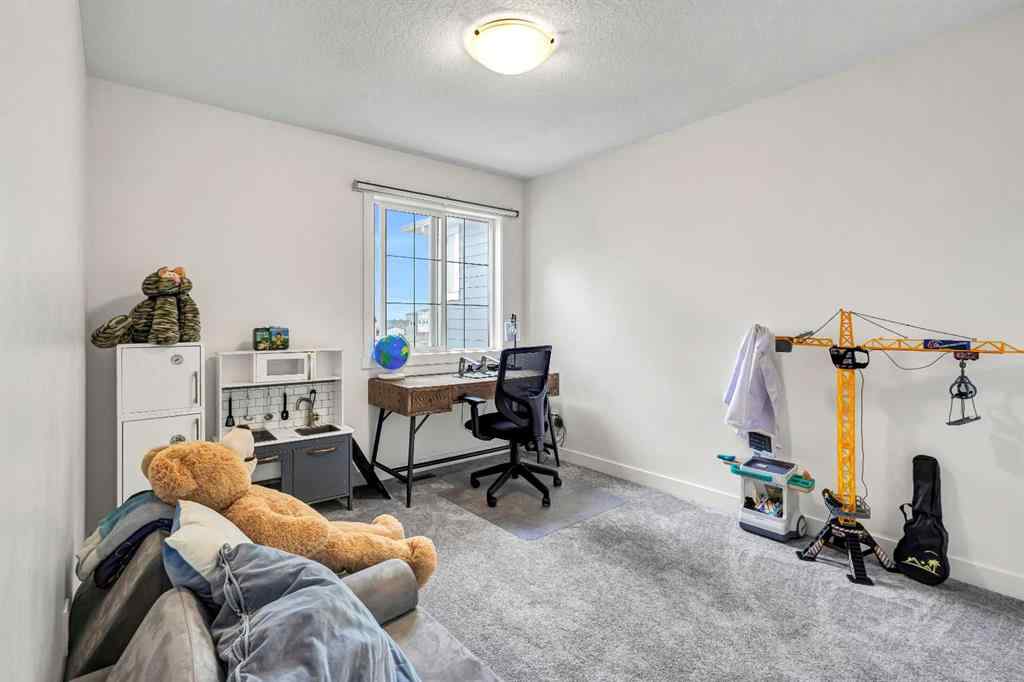 MLS® A2262412 - 890 Bluerock Way SW in Alpine Park Calgary, Residential