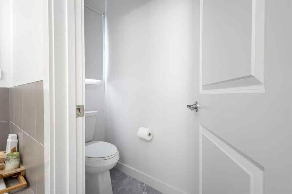 MLS® A2262412 - 890 Bluerock Way SW in Alpine Park Calgary, Residential