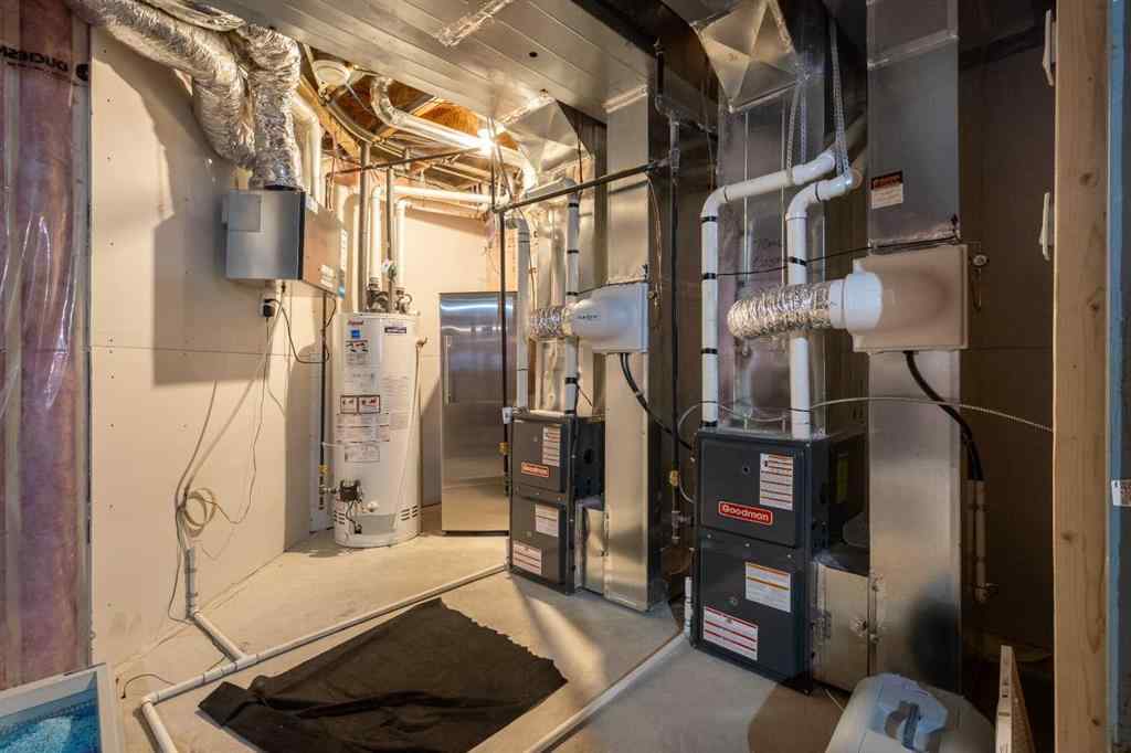 MLS® A2262412 - 890 Bluerock Way SW in Alpine Park Calgary, Residential