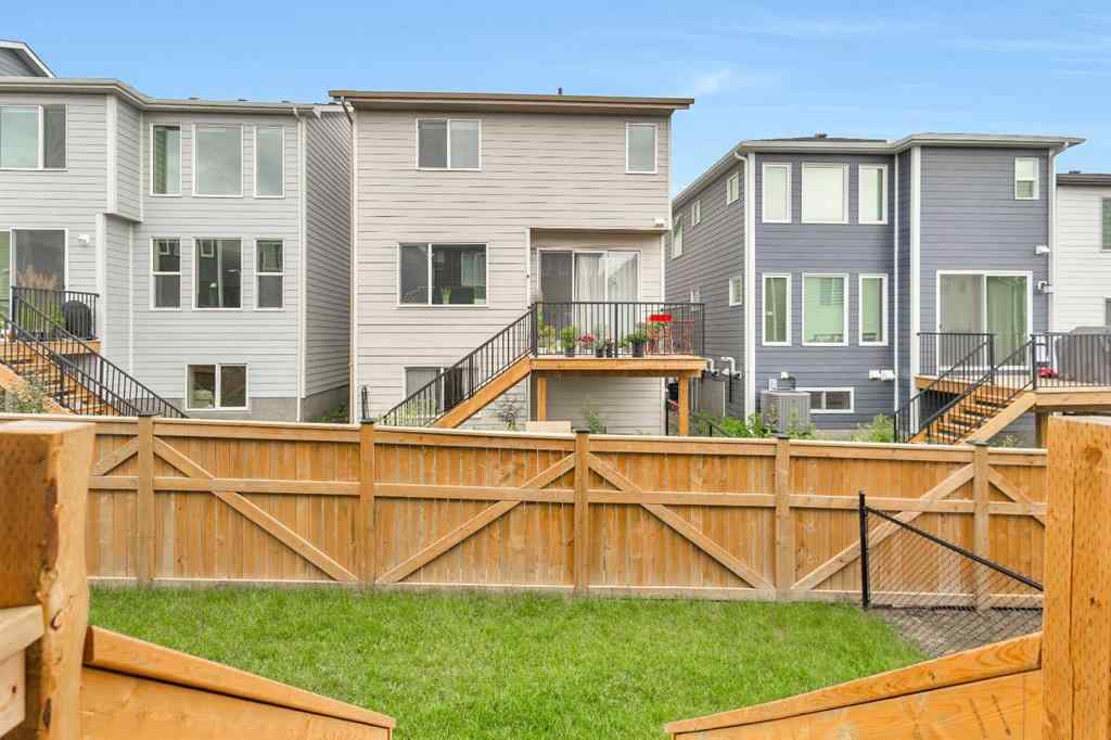MLS® A2262412 - 890 Bluerock Way SW in Alpine Park Calgary, Residential