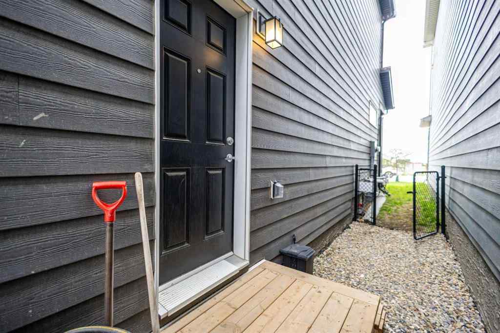 MLS® A2262412 - 890 Bluerock Way SW in Alpine Park Calgary, Residential