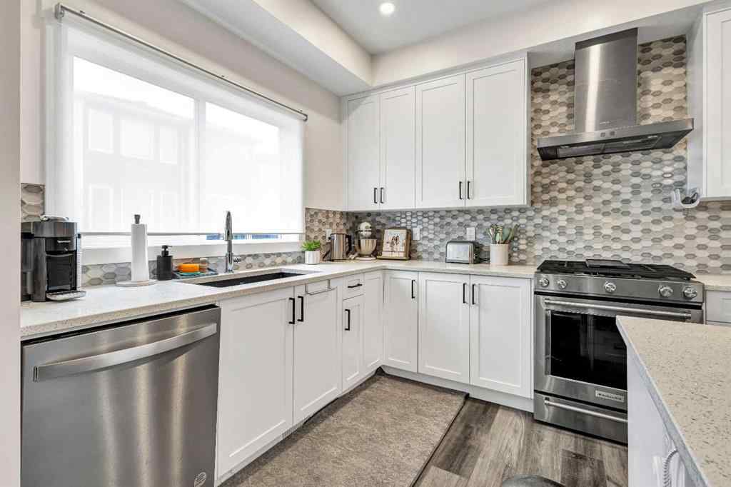 MLS® A2262412 - 890 Bluerock Way SW in Alpine Park Calgary, Residential