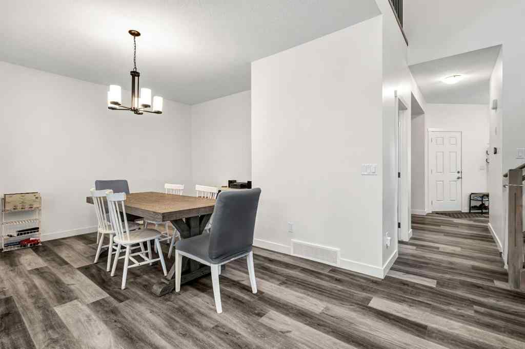 MLS® A2262412 - 890 Bluerock Way SW in Alpine Park Calgary, Residential