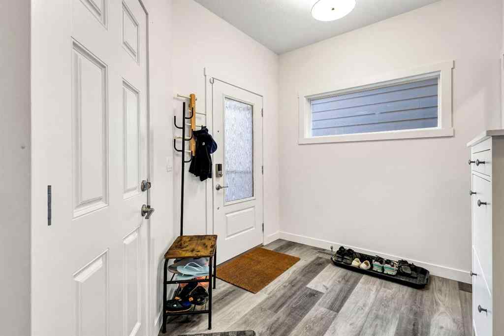 MLS® A2262412 - 890 Bluerock Way SW in Alpine Park Calgary, Residential