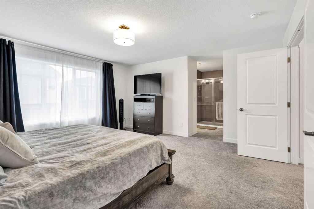 MLS® A2262412 - 890 Bluerock Way SW in Alpine Park Calgary, Residential
