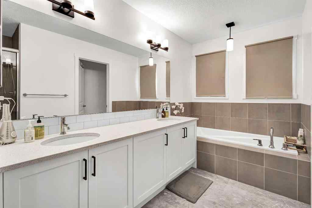 MLS® A2262412 - 890 Bluerock Way SW in Alpine Park Calgary, Residential