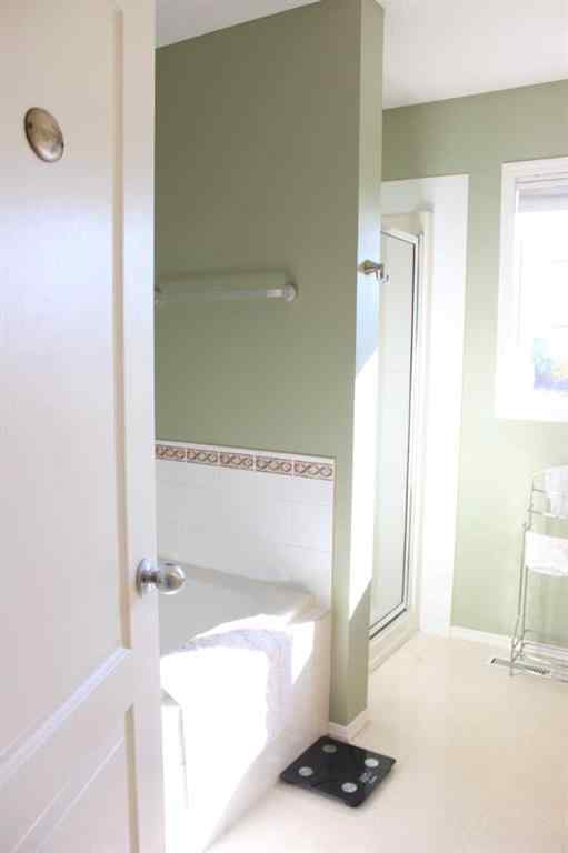 MLS® A2262414 - 64 Tuscany Ridge Green NW in Tuscany Calgary, Residential